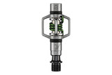 Crankbrothers Eggbeater 2 silver and green MTB pedals with mud shedding design, showcasing the compact, lightweight component for mountain biking.
