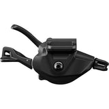 Shimano XTR SL-M9100 12-speed MTB shift lever with instant and multi-release technology, mounted on bicycle handlebar.