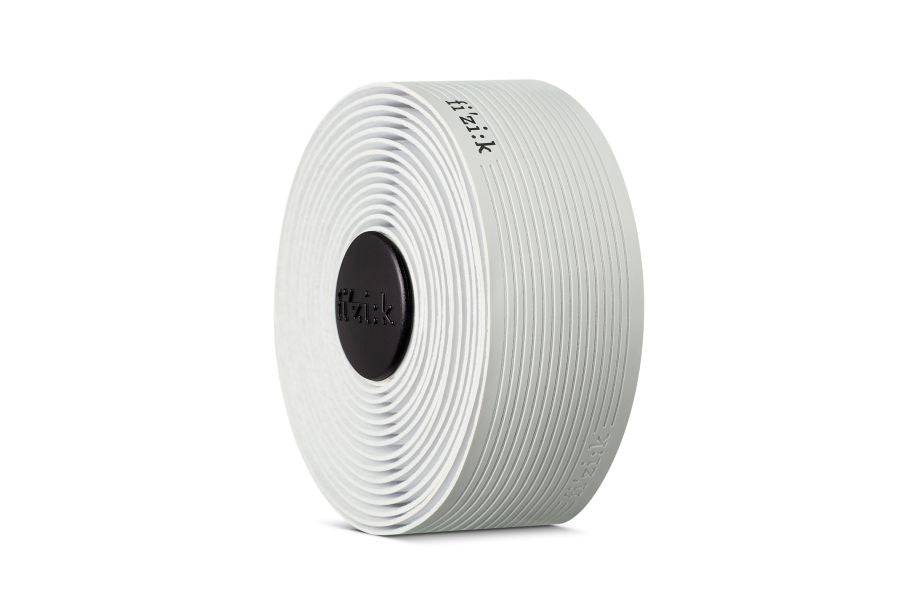 Fizik Vento Microtex Tacky Bar Tape for road bikes, showing close-up of textured, non-slip grip surface on bike handlebar