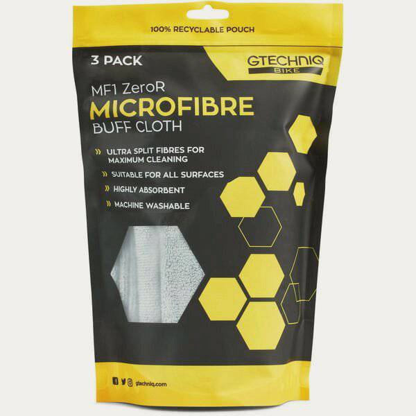 Gtechniq Bike Premium Microfibre Cloth Triple Pack for bike cleaning and maintenance, shown on a workshop surface.