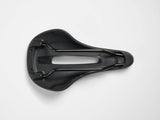 Trek Verse Short Comp bike saddle in black, ergonomic unisex design, measuring 250mm by 155mm for comfortable cycling.