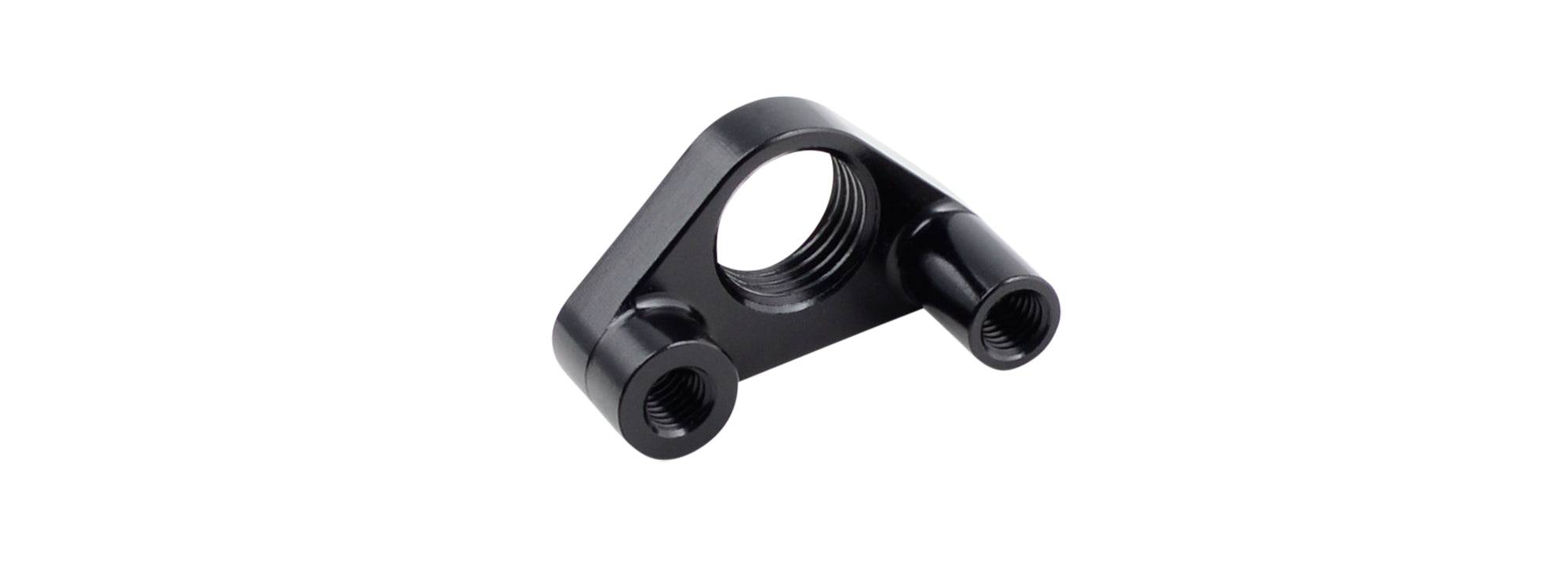 Black Trek Top Fuel 29 2x Low Direct-Mount front derailleur nut for bike components, shown in close-up detail.