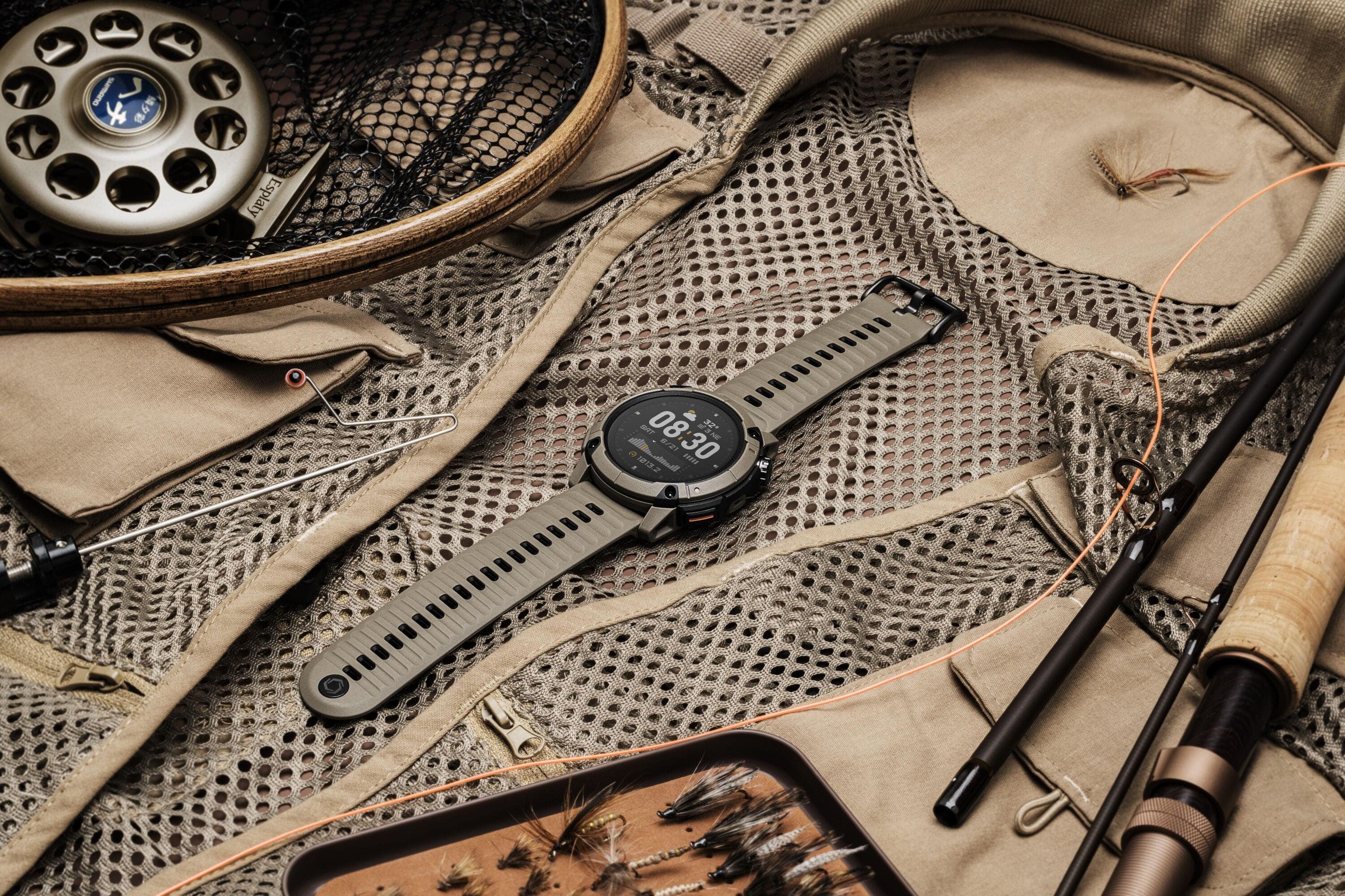 Coros Nomad outdoor GPS watch with brown strap, adventure journal, and multiple sport modes, designed for outdoor activities.