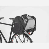 AtranVelo PULSE AVS 36L Duffle Bag in black with reflective details and AVS mounting system, designed for cycling accessories.