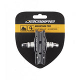 Jagwire Mountain Pro brake pads for linear pull and cantilever MTB brakes, shown in a close-up image of the component.