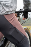 Madison Roam DWR women's cycling leggings with reflective inserts and zipped pocket, designed for active riding and outdoor activities.