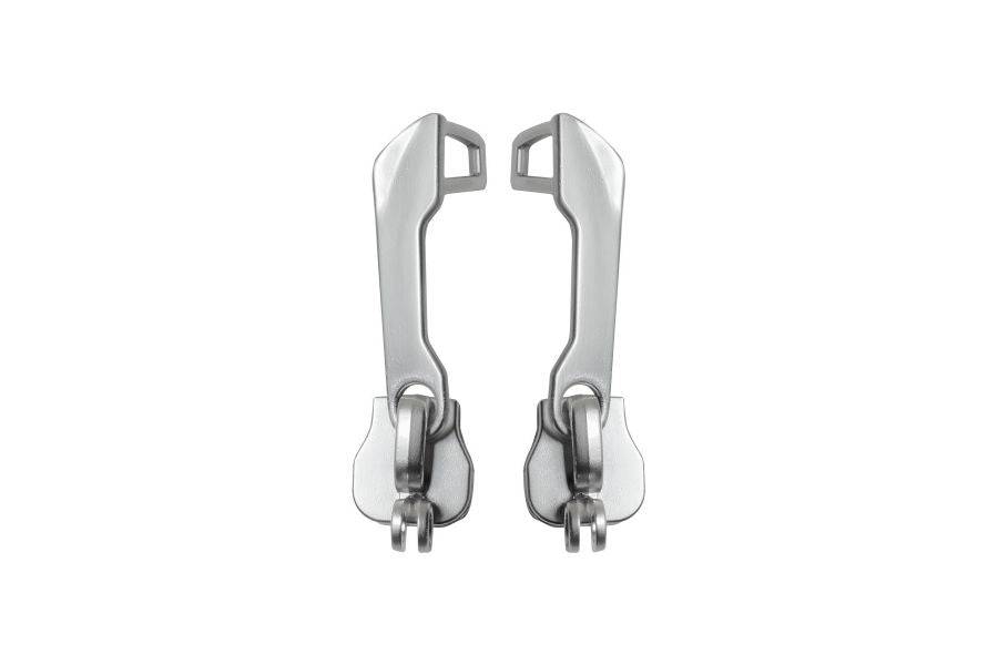 Pair of silver Topeak Spare Pakgo X Zips replacement accessories for bike bags, shown in the image.