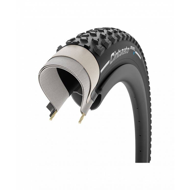 Pirelli Cinturato Gravel S tubeless-ready tire with high grip tread for gravel bikes, shown mounted on a bike wheel.