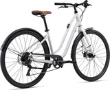 Liv Flourish 3 Disc 2023 women's hybrid bike with ergonomic design and disc brakes, shown with sleek frame and comfortable saddle.