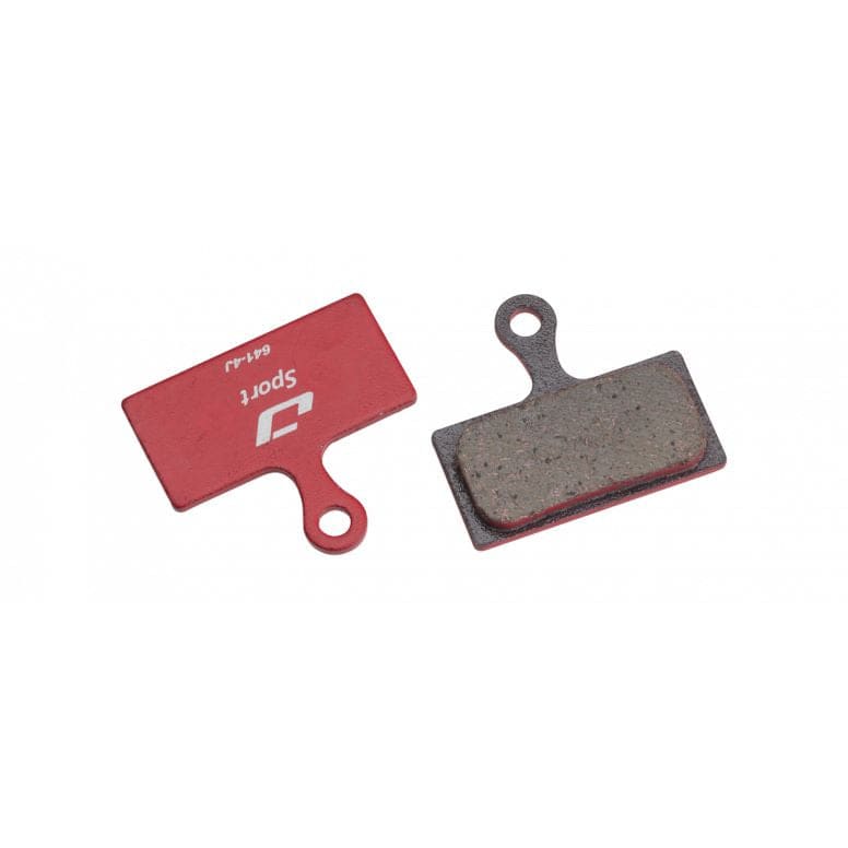 Jagwire Sport semi-metallic disc brake pads for Shimano and RideRever systems, showing the brake pad components and packaging.