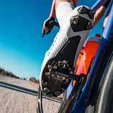 Look X-One-G Ti gravel racing pedals with SPD compatibility and adjustable tension, featuring lightweight titanium construction.