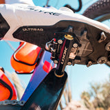Look X-One-G Ti gravel racing pedals with SPD compatibility and adjustable tension, showing the lightweight titanium design and pedal cleats.