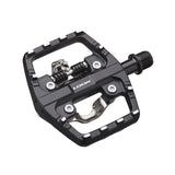 Look X-Venture Plus dual-sided pedals with SPD clipless and flat platform for cycling, shown with cleats attached.