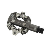 Look X-Track MTB pedals in metallic grey with SPD compatibility and adjustable tension, designed for mountain biking components.