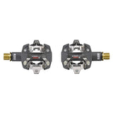 Look X-Track Race Carbon Ti MTB pedals with adjustable SPD cleat tension, lightweight racing bicycle component for mountain biking.