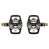 Look X-Track EN-Rage Plus TI MTB pedals with titanium axle, SPD compatibility, featuring black body and clipless pedal design.