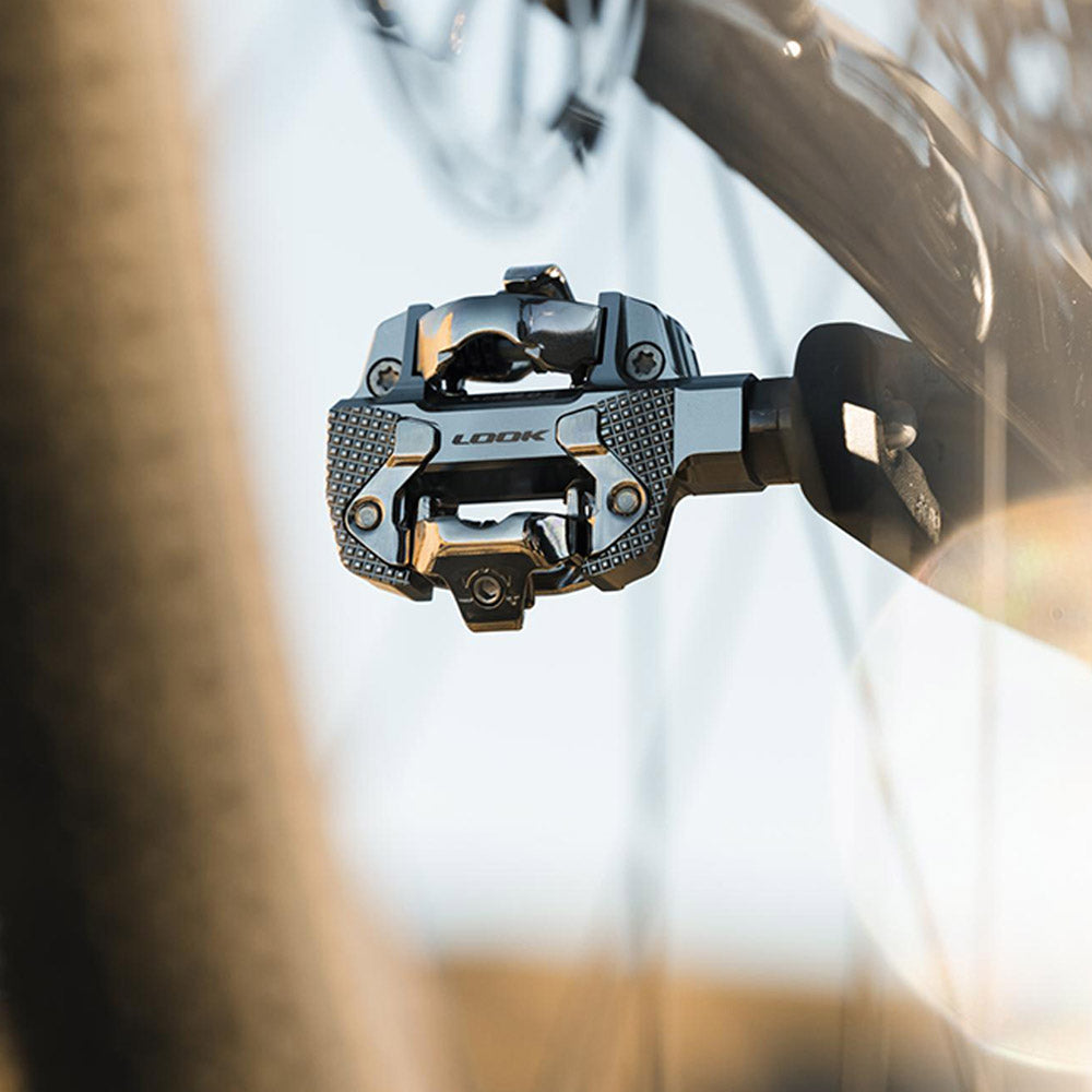 Look X-Track Power Single MTB and gravel pedal with integrated power meter, featuring durable components and clipless design.