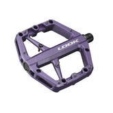 Look Trail Roc flat pedals with concave platform and traction pins in purple, designed for mountain biking components.
