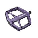 Look Trail Roc flat pedals with concave platform and traction pins in purple, designed for mountain biking components.