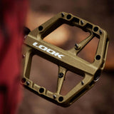 Look Trail Roc flat mountain bike pedals with traction pins, durable components designed for off-road cycling.