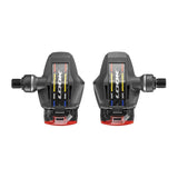 Look Keo Blade Ceramic 12 Vision Road Pedals with integrated safety lighting, showing sleek black pedals with reflective features.