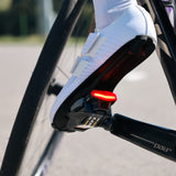 Look Keo Blade Ceramic 12 Vision road pedals with integrated safety lighting, showcasing sleek design and durable construction.