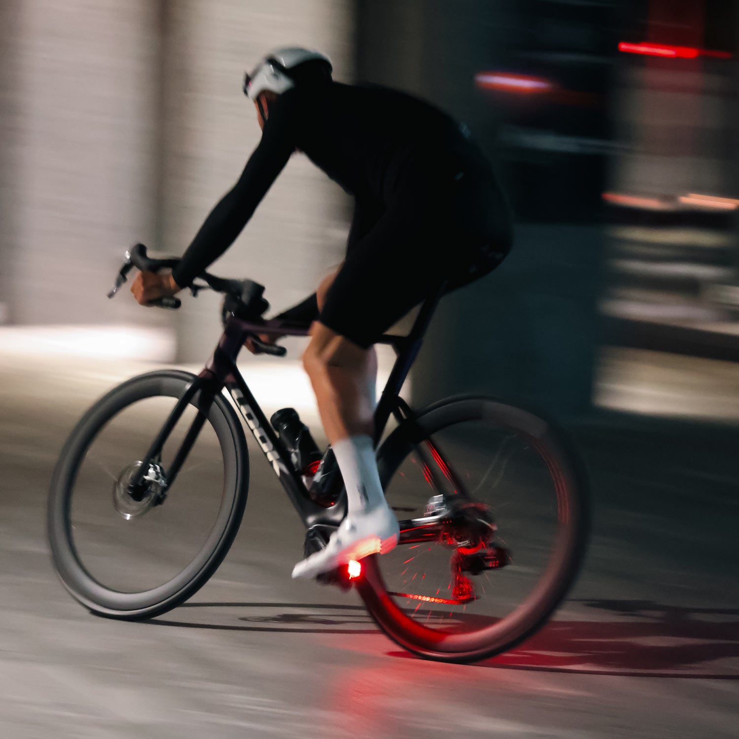 Look Keo Blade Ceramic 12 Vision road pedals with integrated safety lighting, showcasing sleek design and durable ceramic cleats.