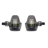 Look Keo Blade ceramic road bike pedals with 56mm Q-factor and adjustable tension, showing sleek design and pedal cleats.