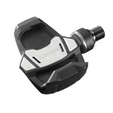 Look Keo Blade Ti ceramic road bike pedals with titanium axles and ceramic bearings, showcasing their sleek design and high-performance components.