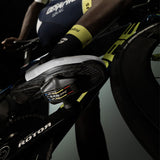 Look Keo Blade Ti ceramic road bike pedals with 12° float and 56mm Q-Factor, showcasing sleek titanium design and pedal cleats.