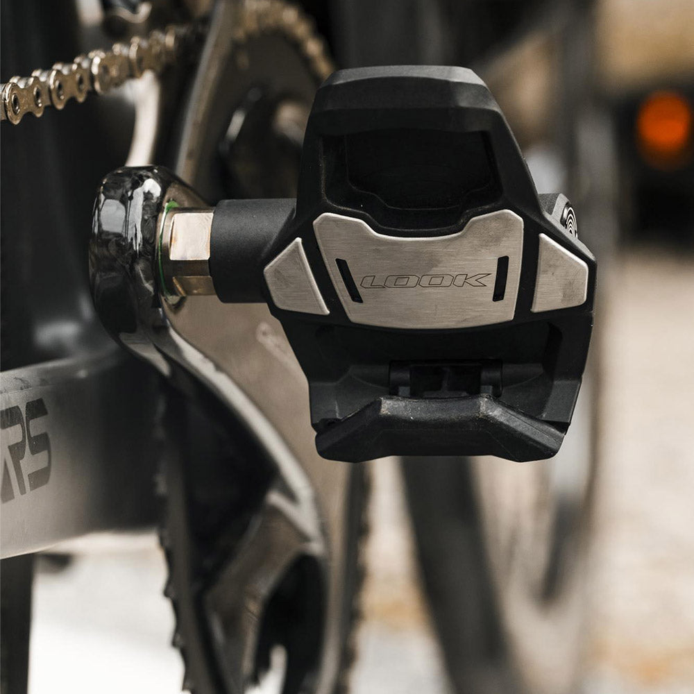 Look Keo Blade Power single road cycling pedal with integrated power meter, black with sleek design and cleat attachment system.