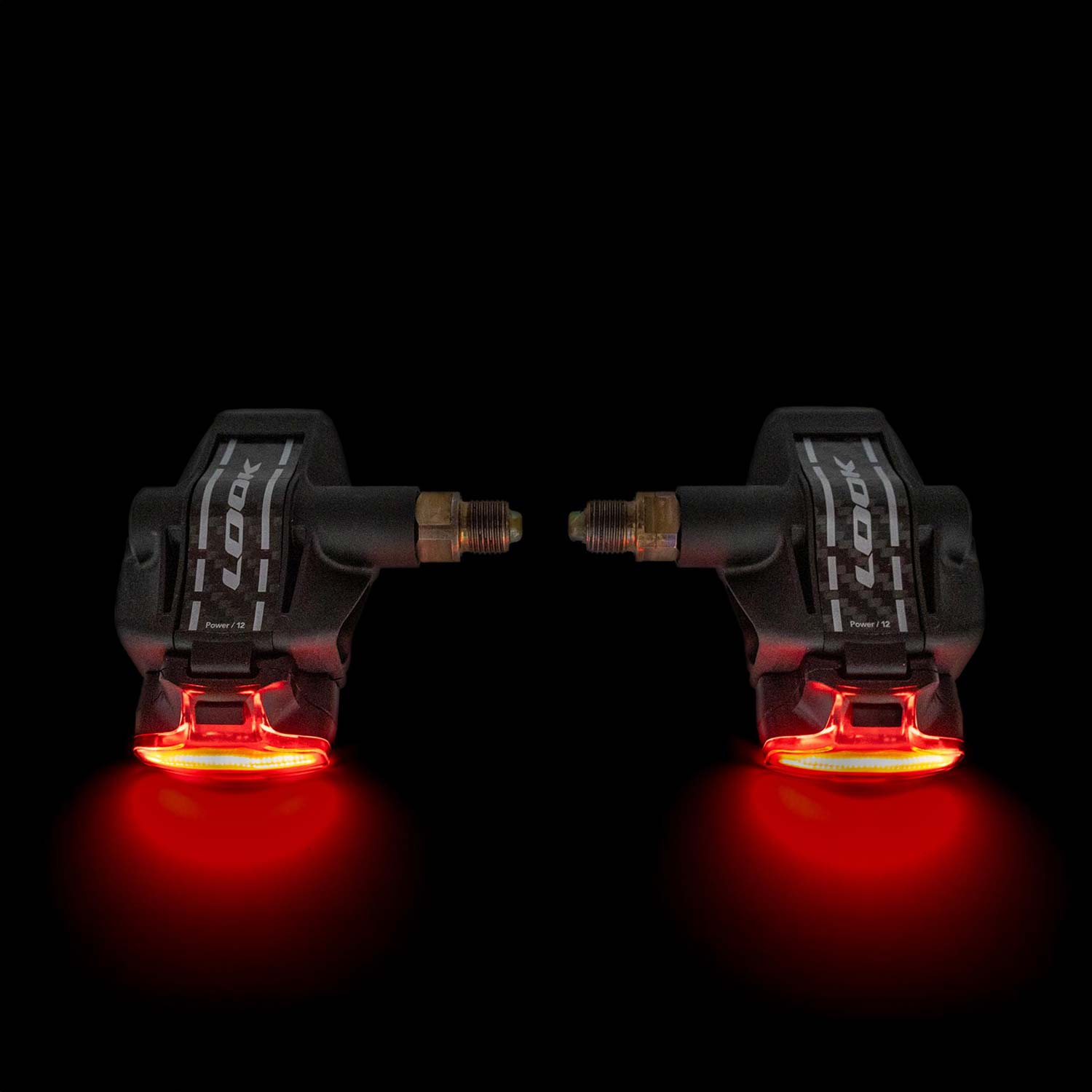 Look Keo Blade Power Dual Vision pedals with integrated power meter and safety lights, shown with sleek design and pedal cleats.