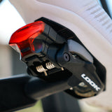 Look Keo 2 Max Vision Black pedals with integrated safety lights and USB-C rechargeable system, shown on a bicycle pedal.