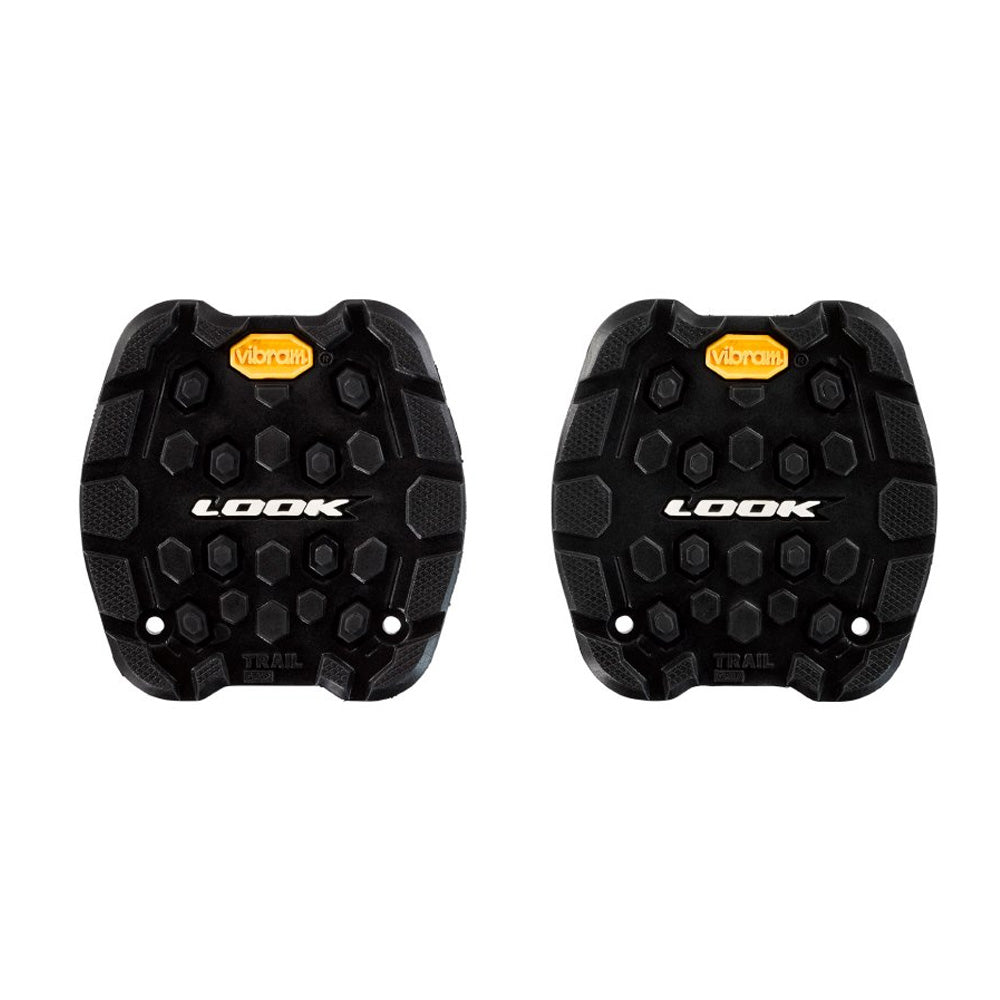 Look Trail Grip Pads with VIBRAM Activ Grip technology for off-road pedals, showcasing durable rubber components for enhanced traction.