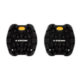 Look Trail Grip Pads with VIBRAM Activ Grip technology for off-road pedals, showcasing durable rubber components for enhanced traction.