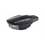 Moon Sport Mizar black front bike light with magnetic quick release and USB charging, mounted on a bicycle handlebar.