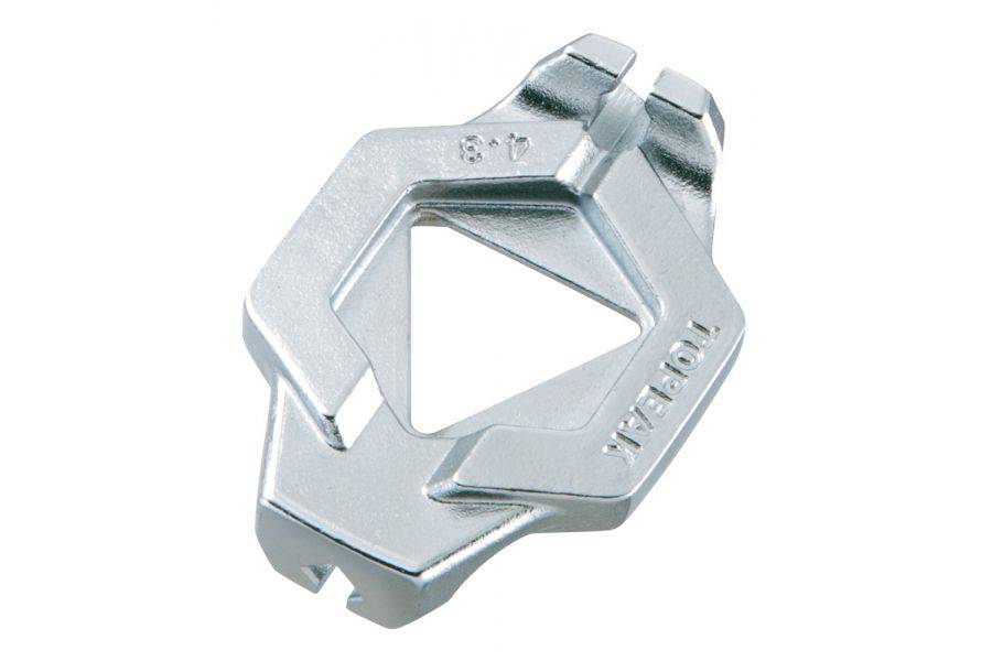Topeak Duo Spoke Wrench tool for precise bike wheel spoke adjustments, shown in a workshop setting with the tool in hand.