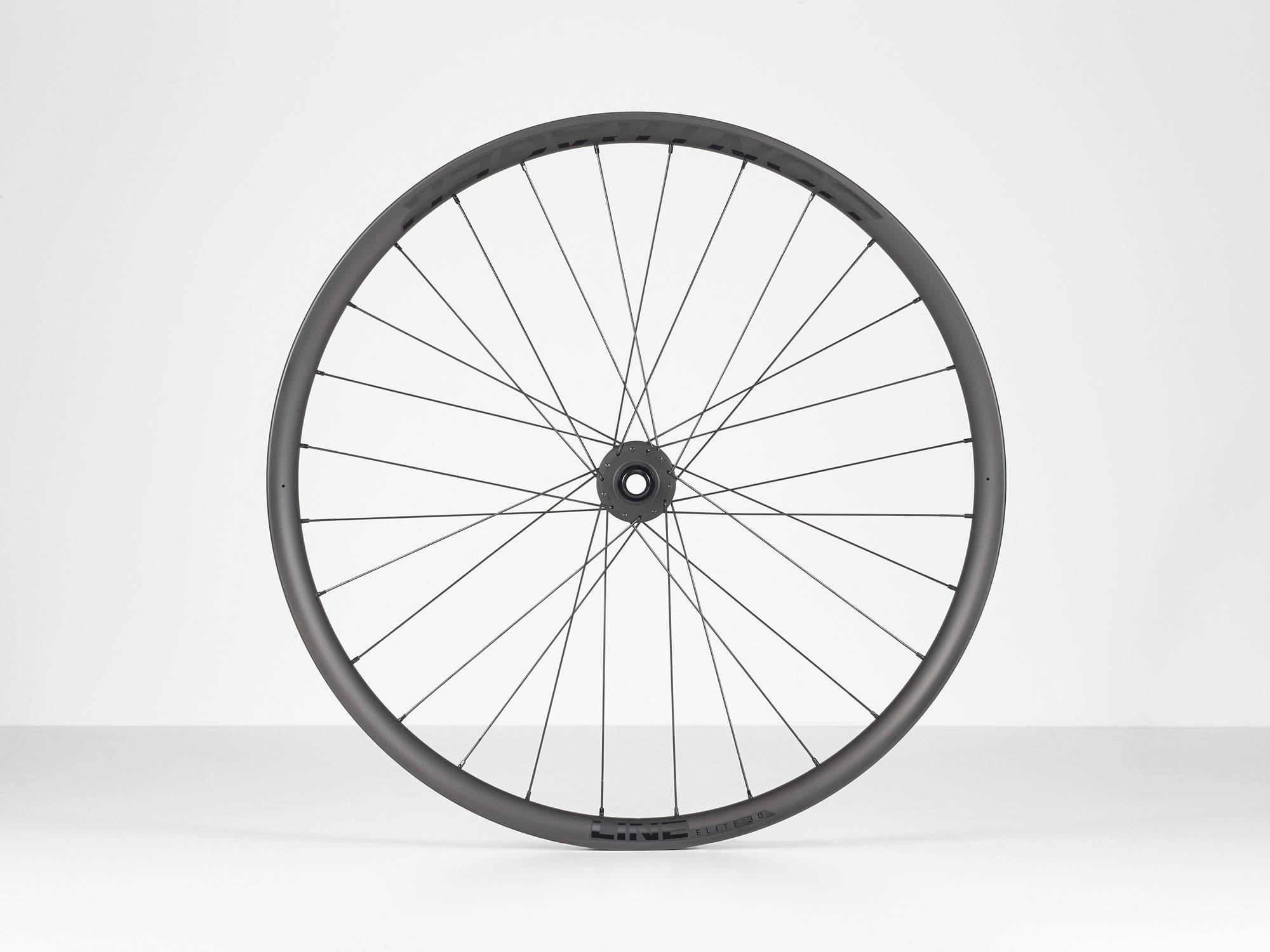 Black Bontrager Line Elite 30 TLR Boost 27.5 MTB front wheel with tubeless-ready rim and boost spacing, no cassette included.
