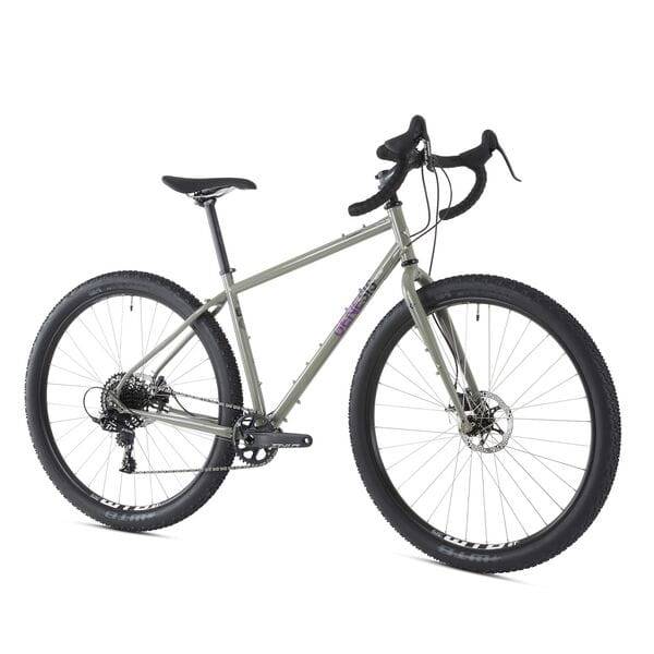 Genesis Vagabond gravel bike with 29-inch wheels and Sram Apex drivetrain, ideal for touring and commuting on rugged terrain.