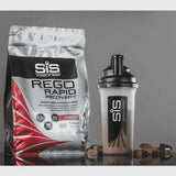 Science In Sport Rego Rapid Recovery vegan drink powder for post-workout recovery, shown in a scoop with the supplement.