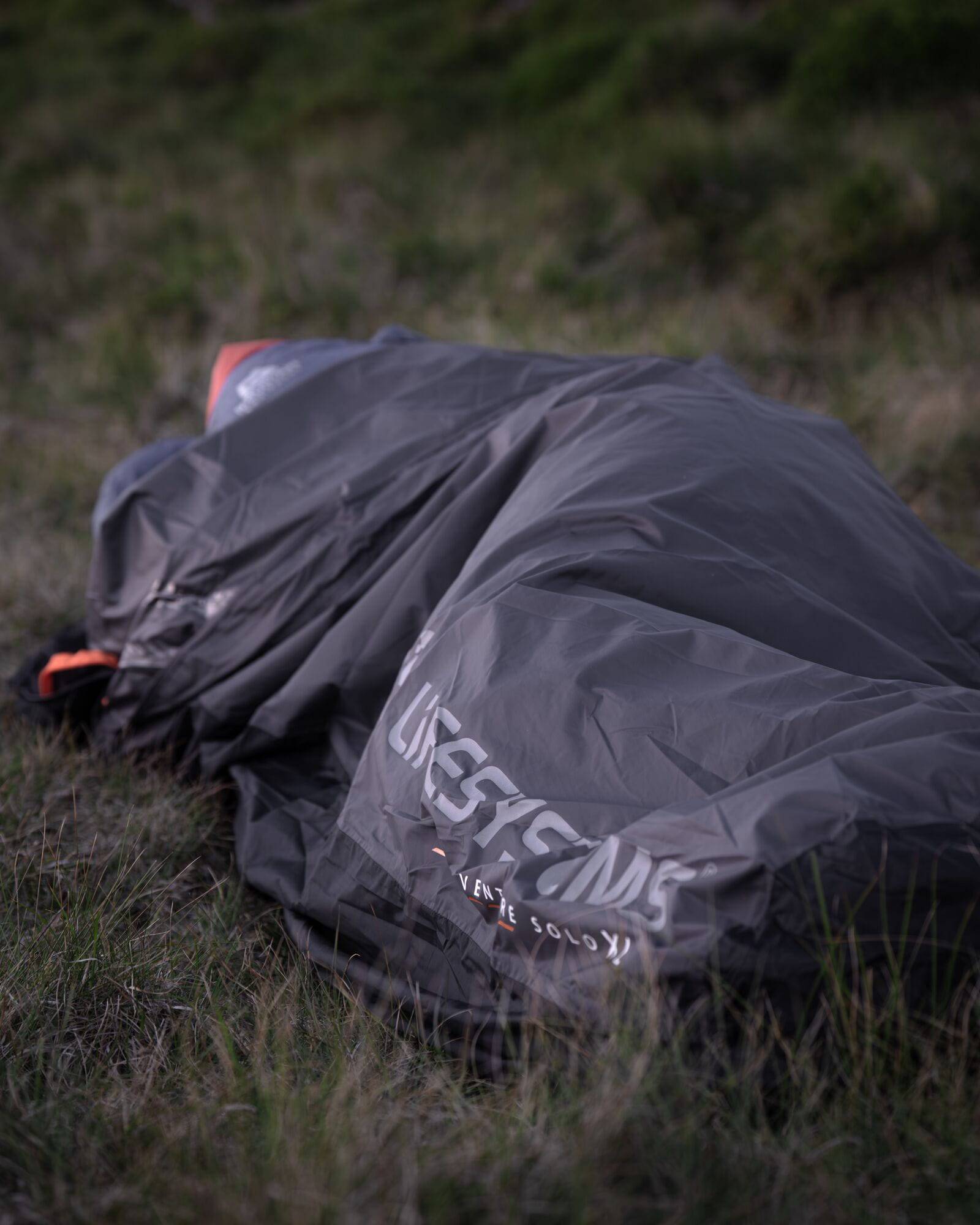 Lifesystems Venture Solo Hooped Bivi Shelter waterproof and breathable bikepacking tent shown in a compact outdoor setting.