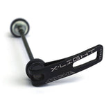 Miche Xlight alloy road bike quick release skewer set with anodised finish, lightweight bike components for secure wheel attachment.