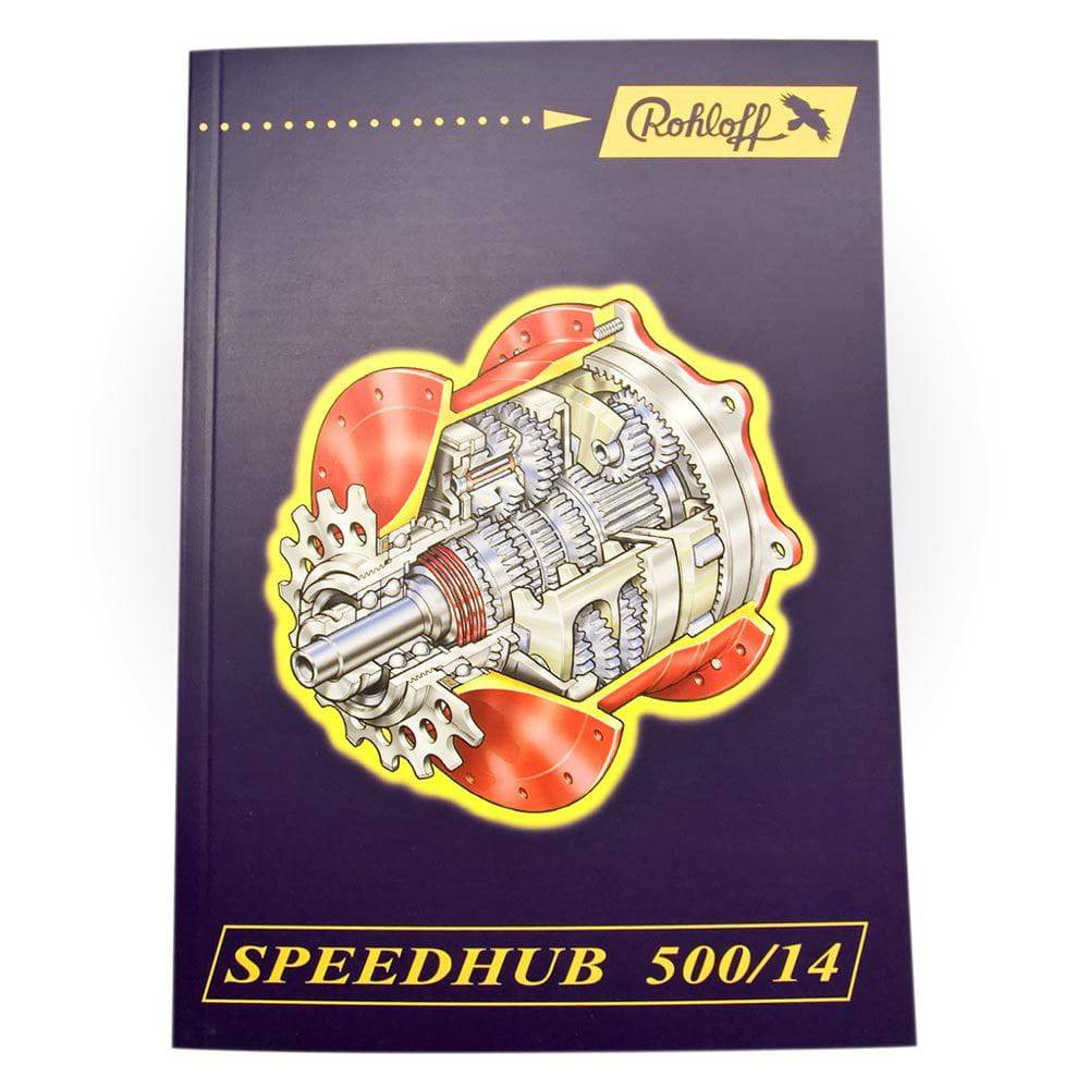 Rohloff Speedhub workshop manual and genuine hub spares for bike maintenance, showing tools and components on a workbench.