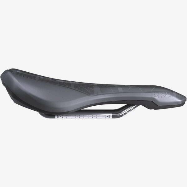PRO MSN 1.3 Enduro Saddle with carbon-reinforced base and drainage port, designed for durable mountain biking comfort.