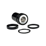 Cane Creek 50x10mm mounting hardware for TREK offset Double Barrel shock, black, close-up of component for mountain bike suspension