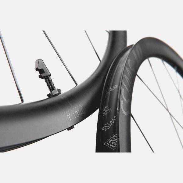 DT Swiss T 1800 front track wheel with 30mm aero alloy rim, clincher design, tubeless-ready for high-performance cycling.