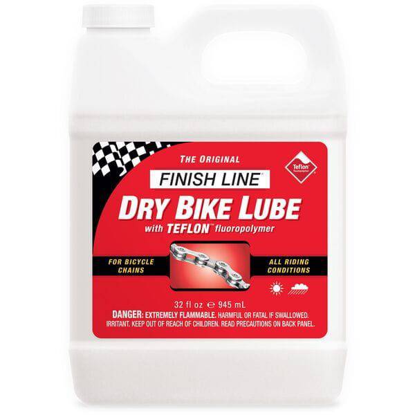 Finish Line Dry Chain Lube Teflon Plus synthetic bike lubricant applied to a bike chain for smooth drivetrain performance.