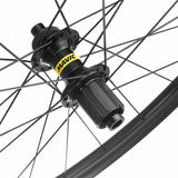 Mavic Cosmic S 42 Disc Carbon Road Wheels with UST Tubeless Technology, showcasing lightweight carbon rims and disc brake compatibility.