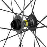 Mavic Cosmic Ultimate 45 Disc Road Wheelset with aerodynamic carbon rims and tubeless design, close-up view of the wheelset components.
