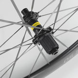 Mavic Comete 50 ceramic bearing carbon disc wheelset for road bikes, featuring aerodynamic design and high-performance components.